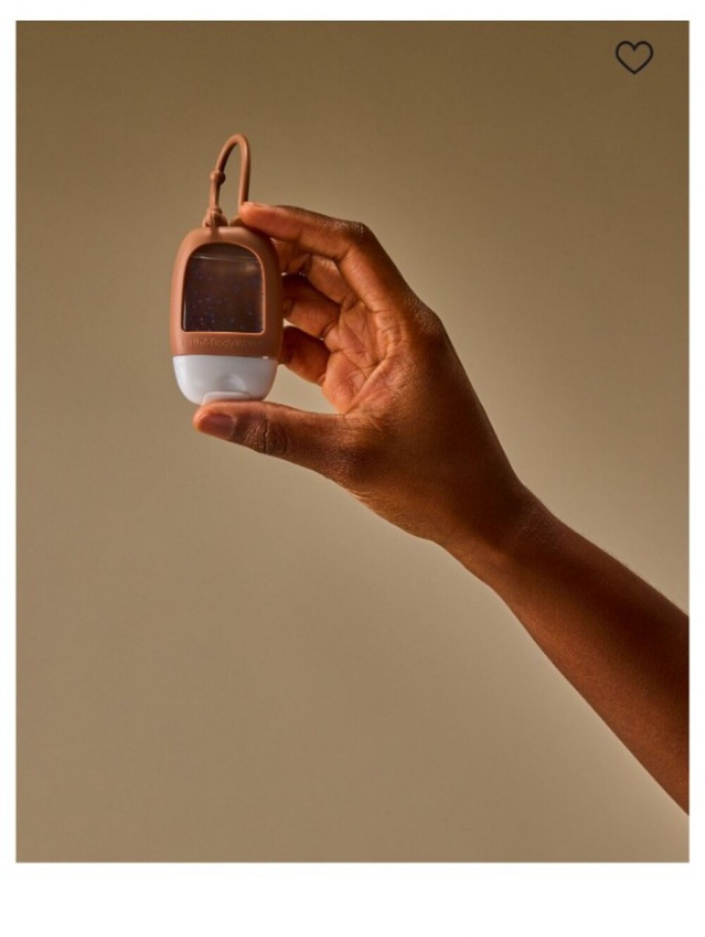 Bath & Body Works tan and white silicone hand sanitizer holder